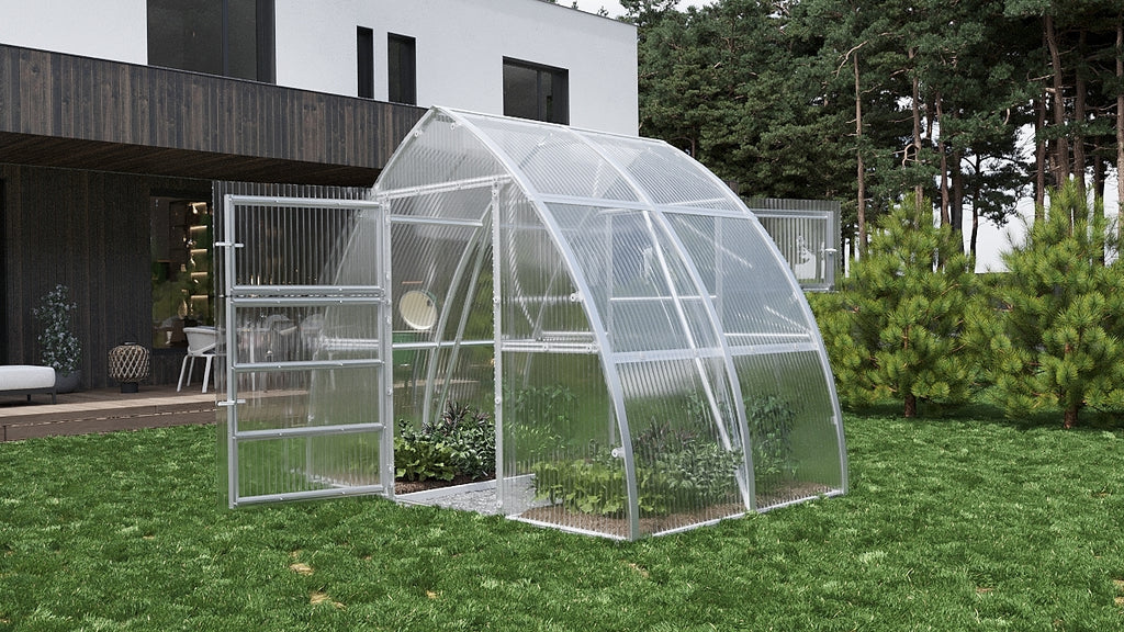 Serre de jardin L'Apogée en polycarbonate, vue trois quarts au jardin